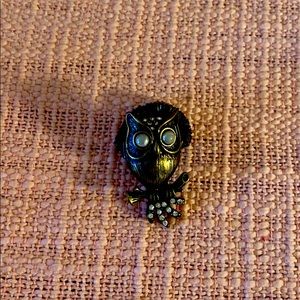 Owl ring.